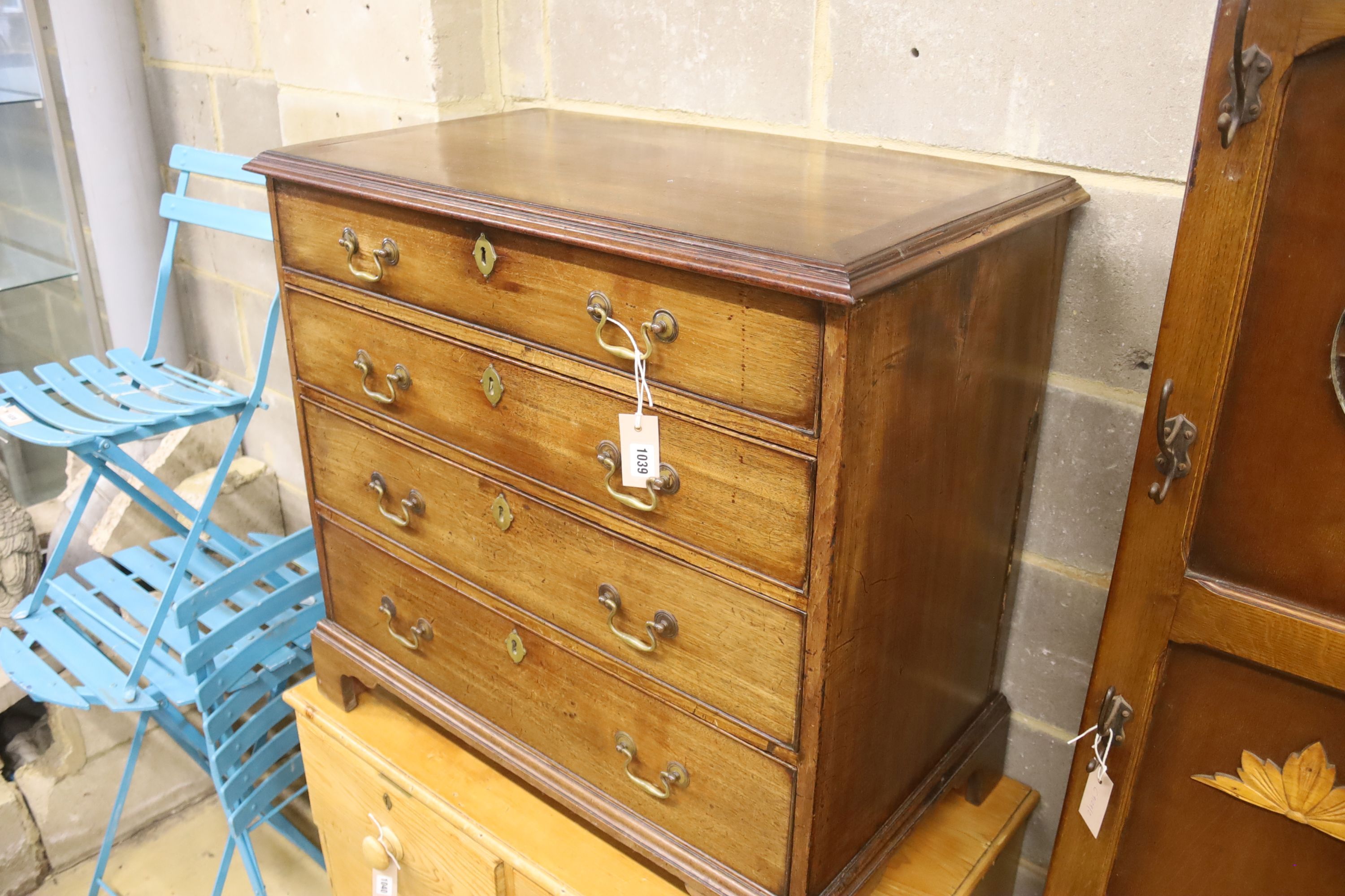 A small George III mahogany chest of four long drawers, width 82cm, depth 47cm, height 78cm